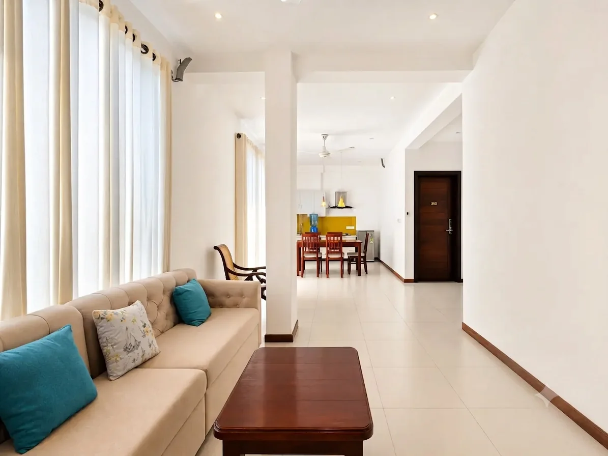 Living and dining area in the Signature Two Bedroom Apartment with City View